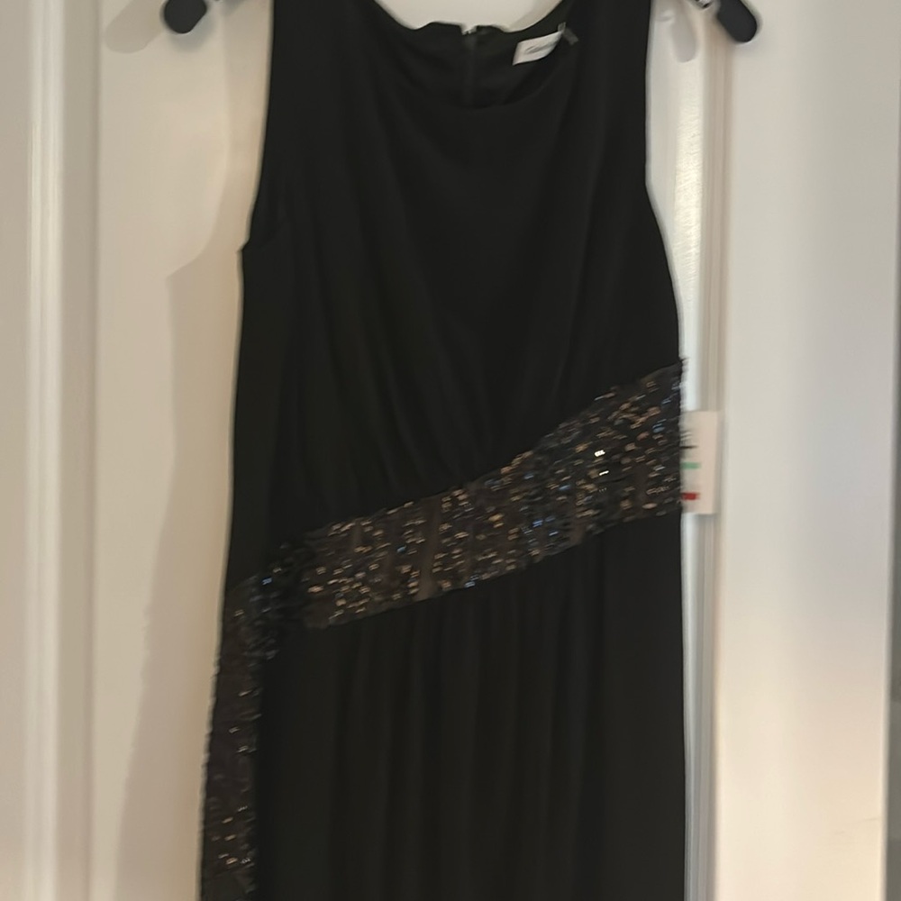 Short black formal or semi formal cocktail dress.